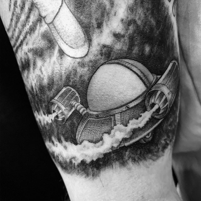 Rick and Morty Spaceship fine line detail tattoo. Book a custom tattoo with Alan at Sacred Mandala Studio - Durham, NC.